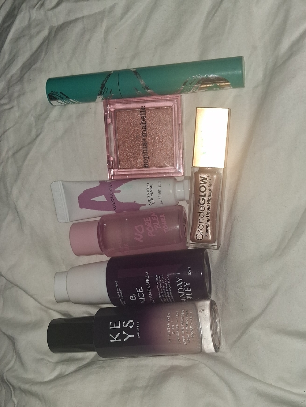 GrandeGLOW Shimmer Liquid Highlighter - Champagne (with Assorted Makeup)